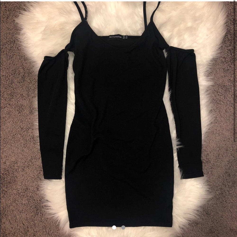 Mini black dress with off shoulder sleeves